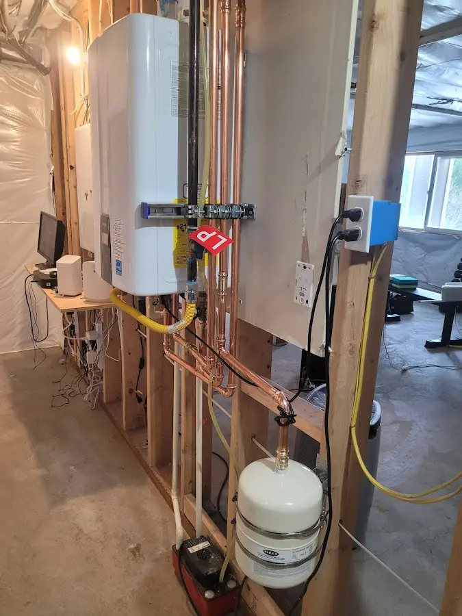 Licensed plumber repairing a kitchen sink in Chipley